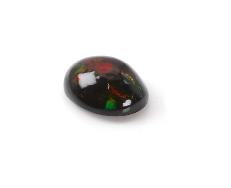 An unmounted oval cabochon black opal, 12.30 x 10.11 x 5.22mm, 3.05ctCondition ReportUntested for origin/treatment.