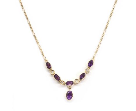 A 9ct gold amethyst and diamond necklace, with a line of oval cut amethysts, alternating to round brilliant cut diamonds, sus