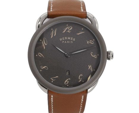 A gentlemen's stainless steel and titanium Hermès Arceau quartz strap watch,  ref. AR7Q.810a; a 40mm case, with a grey dial, 