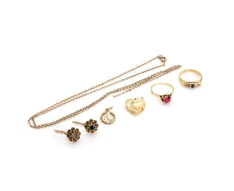 A group of gold jewellery, comprising a synthetic ruby ring, a garnet set ring, both tested as approximately 18ct gold, a cab