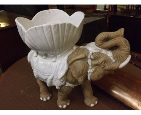 Large late 20th century Italian made ceramic elephant based jardini re, partially white glazed, width 26ins, height 24ins  