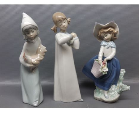 Three Lladro figures, girl with chicken, 8ins tall; girl with musical instrument, 8 1/2 ins tall and girl with basket of flow