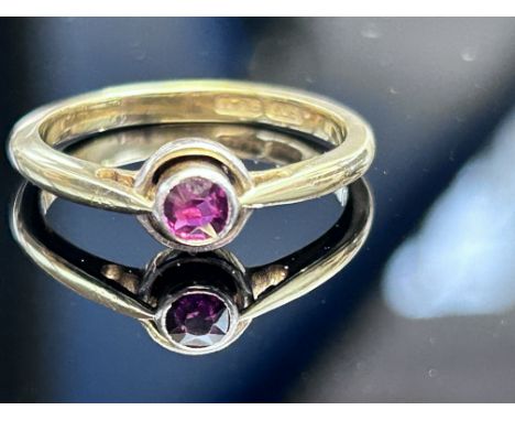 18ct Gold ring with central ruby set in platinum Size N Weight 2.9g
