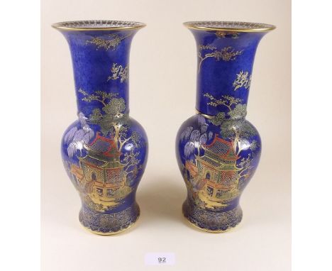 A pair of Carlton Ware Blue Royal vases painted chinoiserie scenes , 28cm high