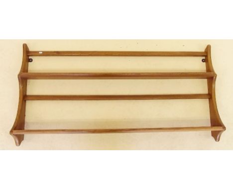 An Ercol 'Golden Dawn' elm plate rack