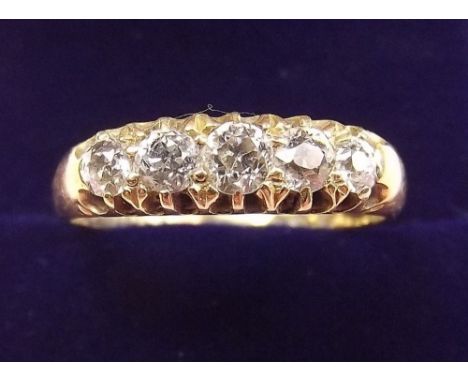 An 18 carat gold five stone diamond ring - size R