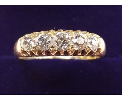 An 18 carat gold five stone diamond ring - size R