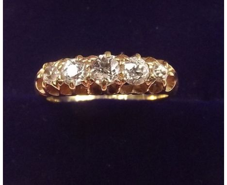 An 18 carat gold five stone diamond ring - size K