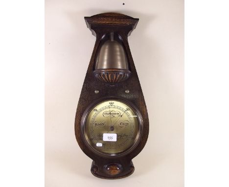 A Delharty oak barometer with gong to top