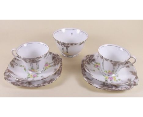 A Lawley's tea service comprising six cups and saucers, five teaplates and sugar