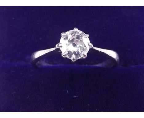 An 18 carat gold and platinum ring set solitaire diamond (over half  a carat), size M