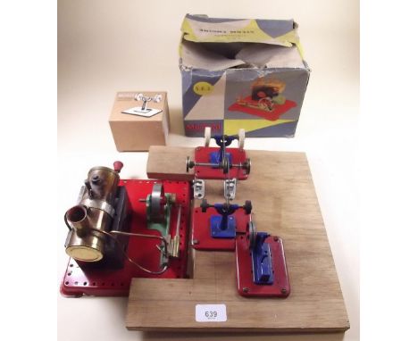 A 1950's Mamod static steam engine SE2 - boxed, and a grinding wheel etc mounted on board