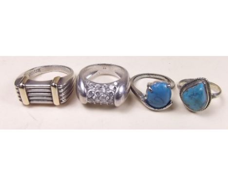 A heavy silver and gold gentleman's ring, two silver and turquoise rings and another ring
