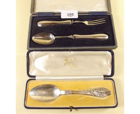 A silver christening spoon and fork, cased - Chester 1923, and a silver Christening spoon decorated Storks - August 1929, cas