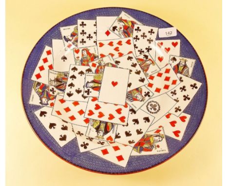 An early 20th century large Creil et Montereau dish painted overlapping playing cards - 35cm