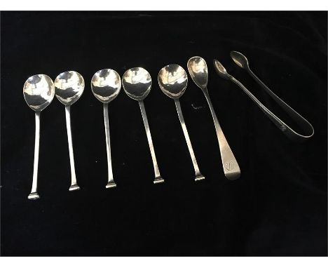 A selection of silver items to include five teaspoons, salt spoon and sugar tongs