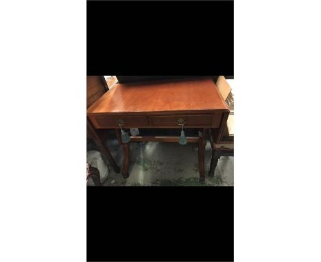 A drop leaf sofa table with two drawers