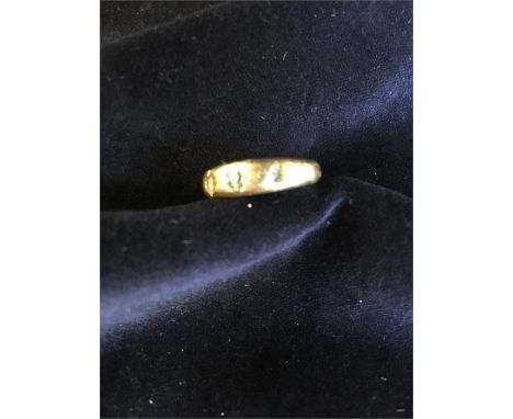 An 18ct gold ring (3.3g), missing stones.