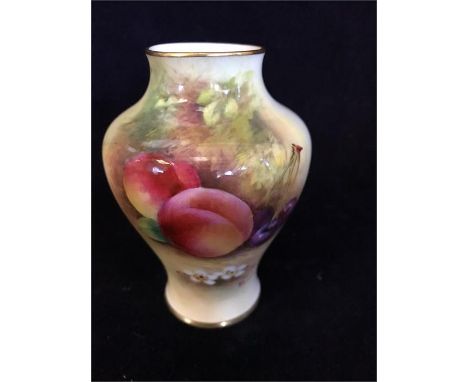 A Royal Worcester vase signed Moseley.