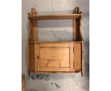 A Pine display shelf with small cupboard