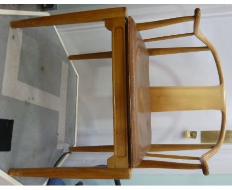 A Hans Wagner design white oak framed China chair for Fitz Hansen, having a horseshoe shaped back and arms, a button upholste