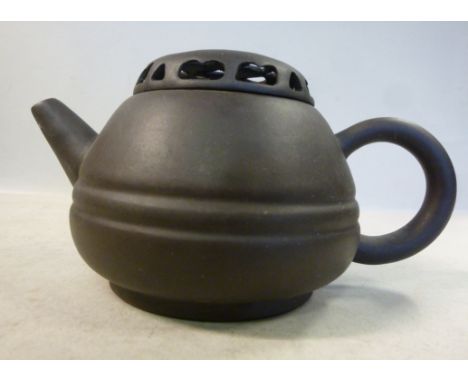 A 20thC Chinese earthenware wine kettle of squat, bulbous form with a decoratively pierced cover  bears impressed seal marks