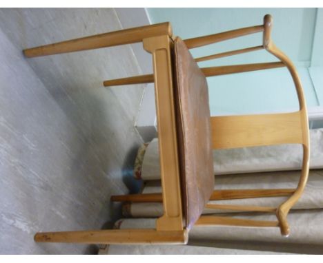 A Hans Wagner design white oak framed China chair for Fitz Hansen, having a horseshoe shaped back and arms, a button upholste