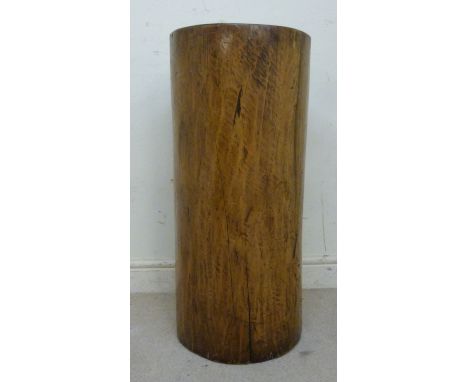 A rough cut, polished and sawn timber tree trunk section pedestal  29''h