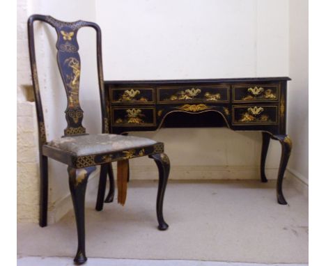 A mid 20thC Sino-European black lacquered, overpainted and gilded kneehole desk, the arrangement of five drawers with decorat