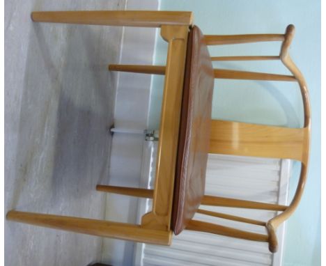 A Hans Wagner design white oak framed China chair for Fitz Hansen, having a horseshoe shaped back and arms, a button upholste