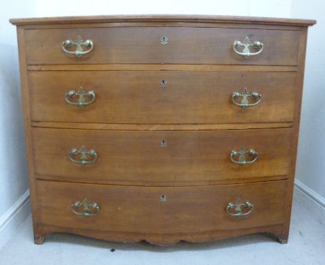 A mid/late 19thC South European fruitwood bow front commode, the top having a round edge, over four lockable, graduated long 