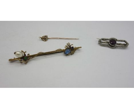 A rolled gold insect brooch, a seed pearl stick pin and a seed pearl brooch, brooch fastener a/f