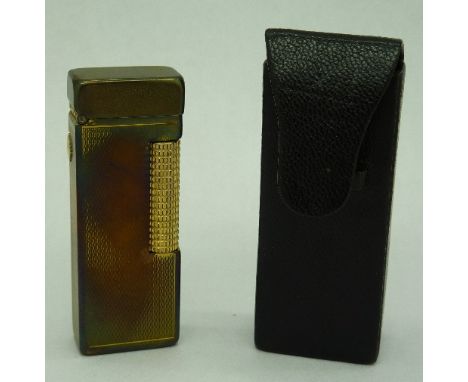 A Dunhill lighter with case