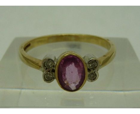 A 9ct gold, diamond and pink stone ring, weight 2.7g, size R