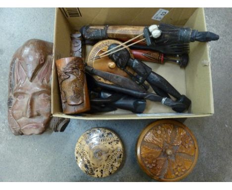 African carvings, blow pipe dart holder, etc.
