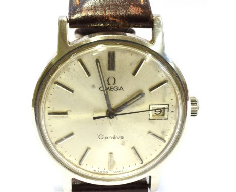 A GENT'S VINTAGE OMEGA STEEL WATCH The round steel dial with date window to 3 o'clock to steel head 36 mm case size, winding 