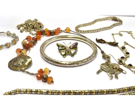 A QUANTITY OF ASSORTED SILVER JEWELLERY  To include bracelets, necklaces, brooch, bangle etc. a total gross weight approx. 13