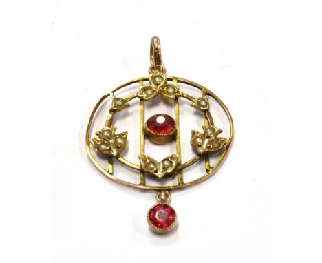 AN EDWARDIAN 9CT GOLD GARNET AND SEED PEARL DROP PENDANT The round openwork pendant with small red garnet to centre and drop,