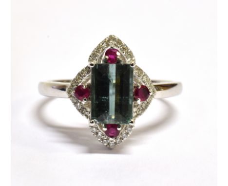 A BLUE/GREEN TOURMALINE DIAMOND AND RUBY SET 14CT WHITE GOLD RING The baguette cut Tourmaline 1.30 carat, stamped to inside s