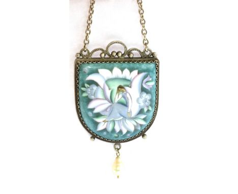 A SILVER AND ENAMELLED 20TH CENTURY SILVER PENDANT The shield shape painted enamel scene of Continental design with drop baro