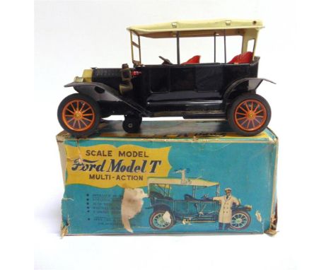 A SUNRISE TOYS NIHONKOGEI (JAPAN) TINPLATE BATTERY-OPERATED FORD MODEL T  black with a removable cream roof, generally good c