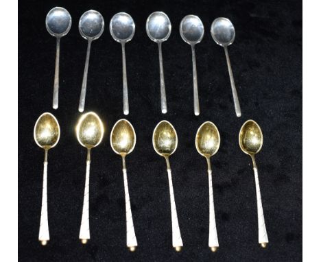TWO SETS OF SIX COFFEE SPOONS One silver gilt and enamelled set stamped Denmark sterling, the other of plain form with Birmin