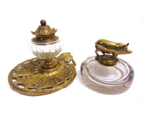 TWO INKWELLS  the first of cast brass, with a glass reservoir, the base marked 'TOWNSHEND &amp; CO' and numbered '3572', over