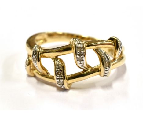 A 9CT GOLD DRESS RING The openwork front set with four very small diamonds, size J ½, gross weight approx. 2.0 grams.