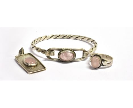 THREE ITEMS OF ROSE QUARTZ SET SILVER JEWELLERY  comprising a plaited design bangle, a pendant and a ring, total weight appro
