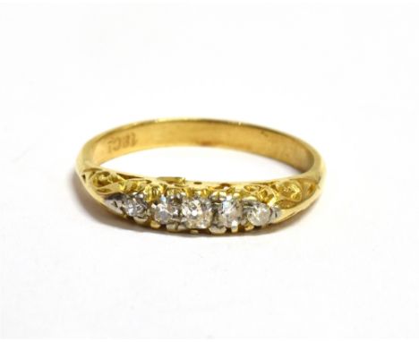 A DIAMOND FIVE STONE 18CT GOLD RING  the boat shaped head claw set with five graduating small old single cut diamonds, shank 