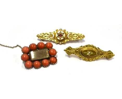 THREE VICTORIAN BROOCHES Comprising two 9ct gold seed pearl set Etruscan style bar brooches both with compartments to reverse