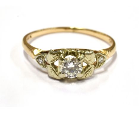 A DIAMOND SOLITAIRE 18CT GOLD RING  The round brilliant cut diamond approx. 0.20 carats with two small diamonds to shoulders,