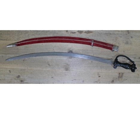 An eastern sword and scabbard, blade length 74cm.  