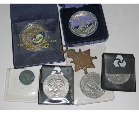 A mixed lot comprising a Concorde commemorative silver proof ten dollar coin, an Elvis Presley 5 dollar proof coin, other coi